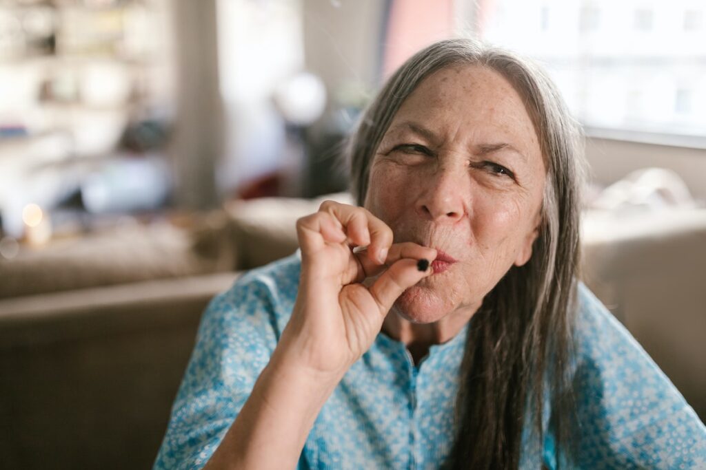 Happy older woman celebrating 420. 
