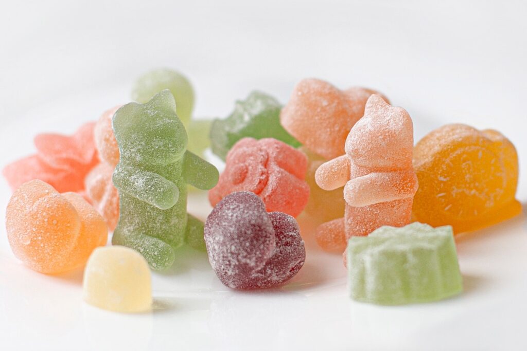 Delta 8, Delta 9 (Compliant), Delta 10, and Delta 11 gummies in a variety of shapes. 