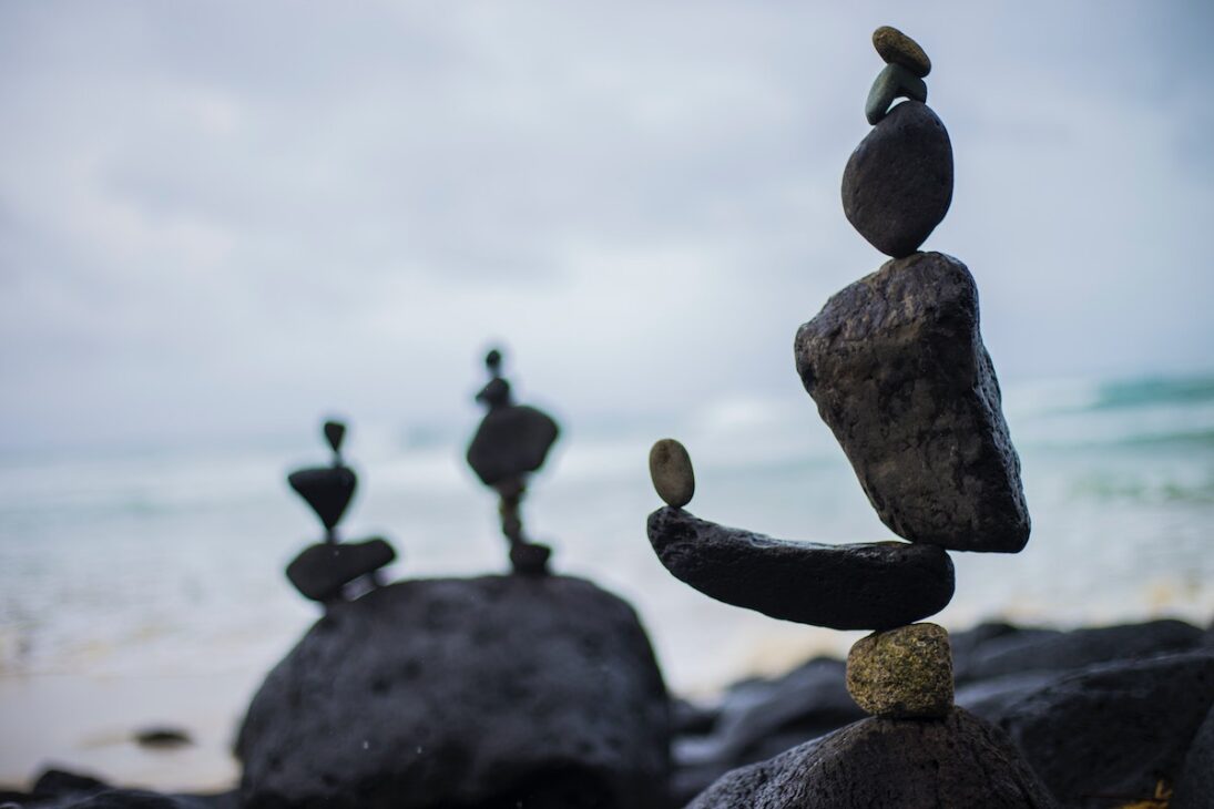 Rocks balancing near the water. Balancing is a requirement when owning a cannabis business. 