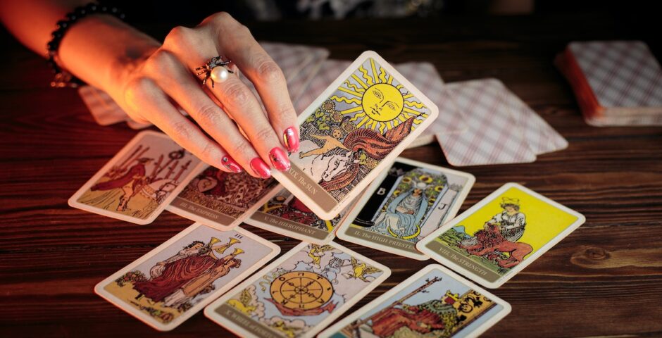 Using tarot cards on the new moon.