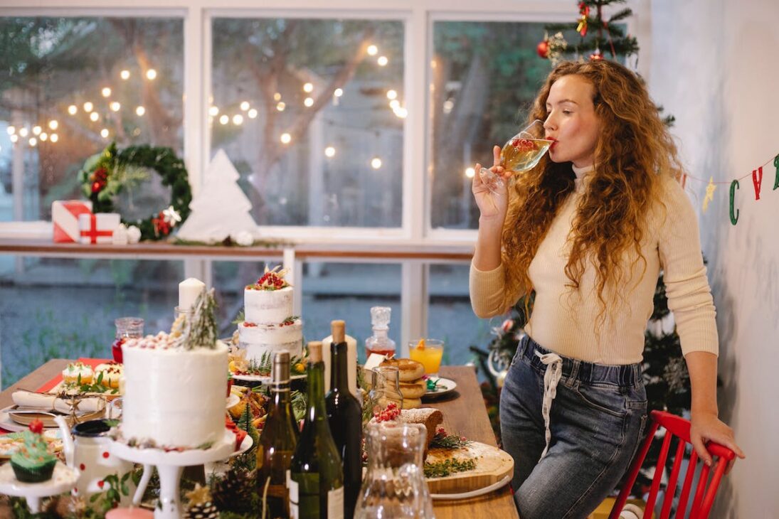 Woman drinking during the holidays. 