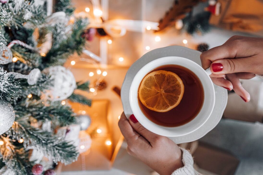 A cup of hot tea during Christmastime. 