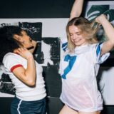 Women dancing after consuming cannabis mood gummies