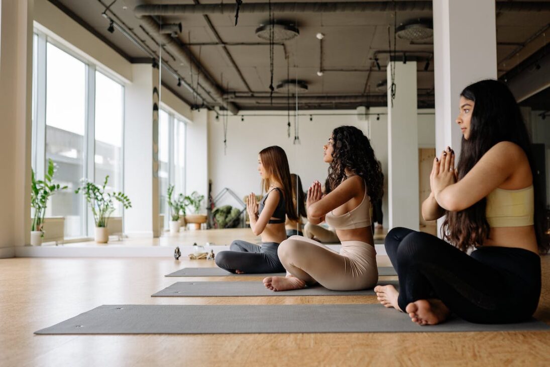 Women in a yoga class after consuming cannabis mood gummies 